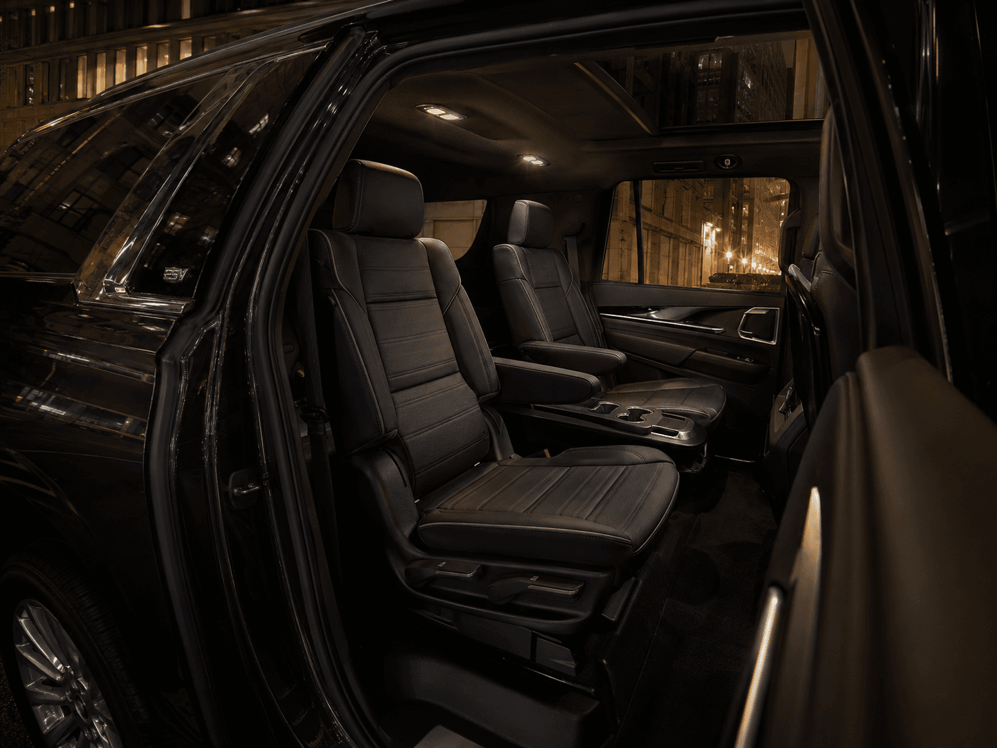 Black leather executive passenger interior of a Cadillac Escalade